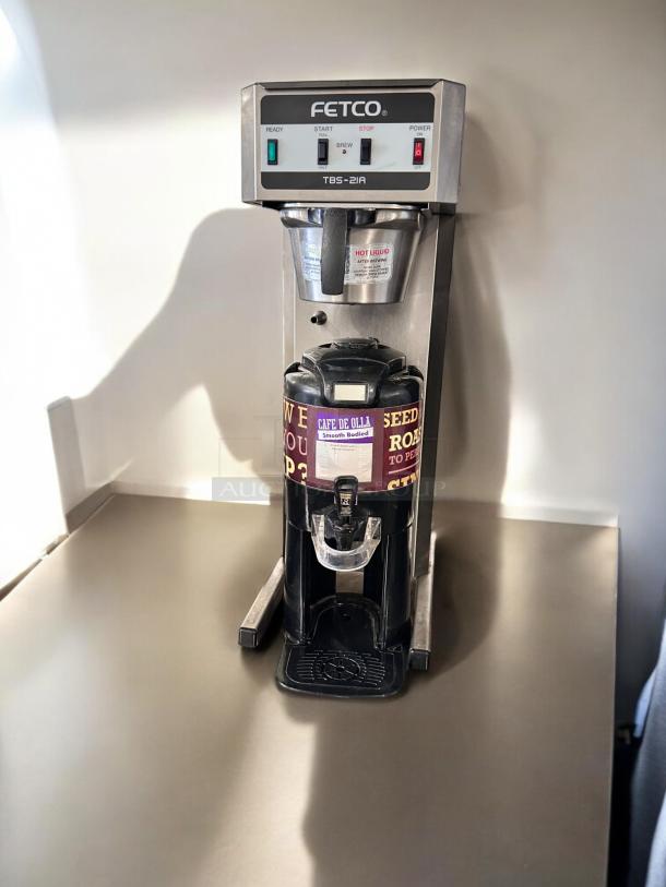 Fetco TBS-21A tea brewer in excellent condition, 120V, fully tested and working, with control panel and carafe.