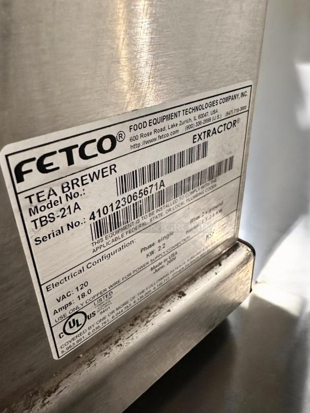 Fetco TBS-21A tea brewer, excellent condition, 120V, fully tested. Manufacturer label shown with model and serial number.