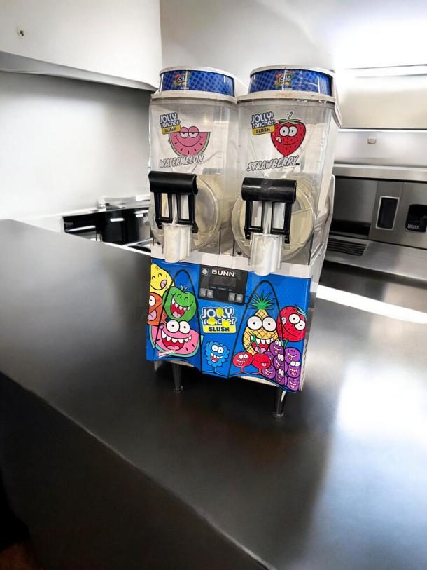 Bunn ULTRA-2 dual bowl slush machine, excellent condition, 120V, fully tested. Decorative "Jolly Rancher" graphics.