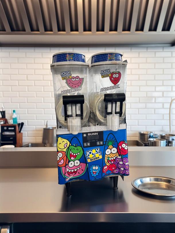 Bunn ULTRA-2 dual bowl slush machine, excellent condition, Jolly Rancher graphics, fully tested, 120V, on counter.