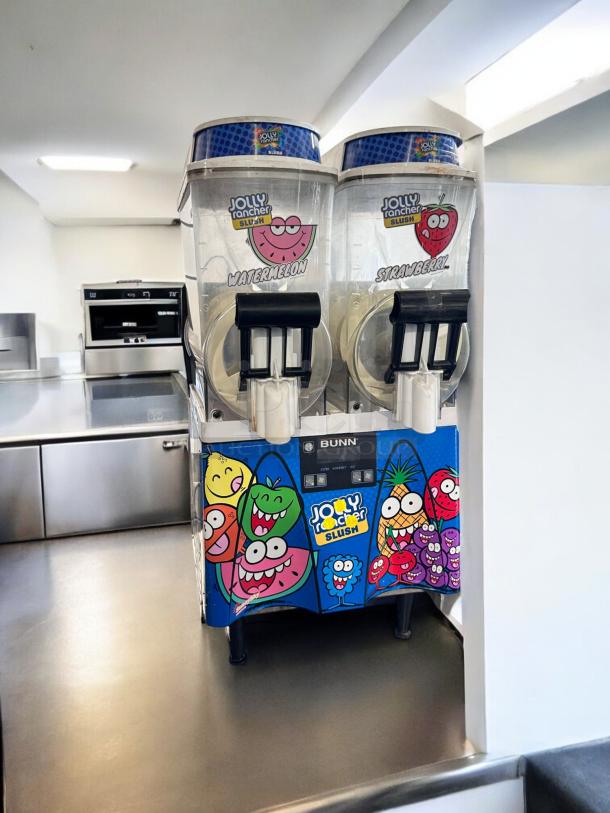 Bunn ULTRA-2 dual bowl slush machine, 120V, vibrant Jolly Rancher branding, excellent condition, fully tested and working.