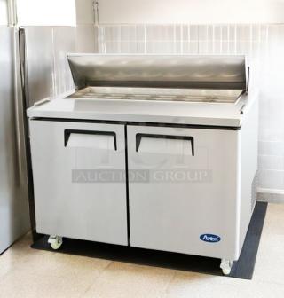 "Atosa MSF8302 48-inch two-door salad prep table refrigerator in excellent condition, fully tested and working."