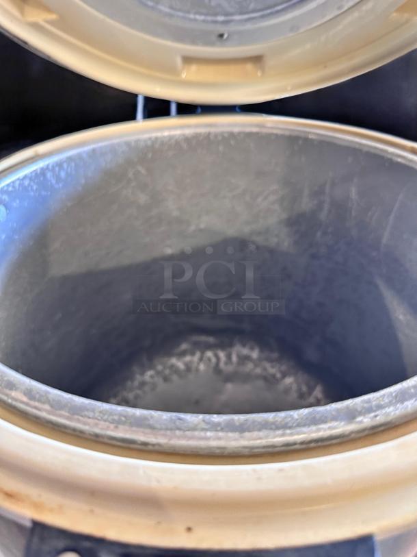 Zojirushi THA-803S electric rice warmer in excellent condition, fully tested and working, 120V. Interior view shown.