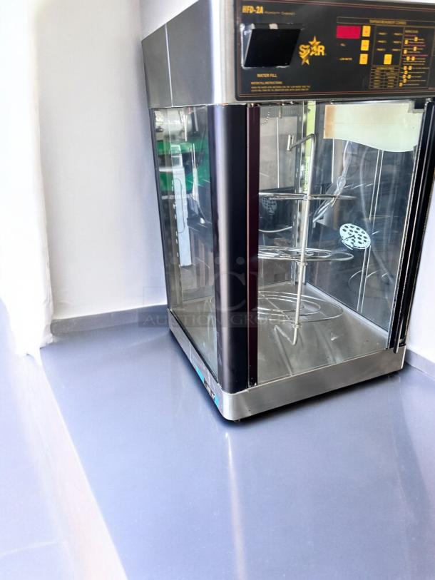 Star HFD-2A heated display cabinet with rotating racks, excellent condition, 120V, fully tested and working.