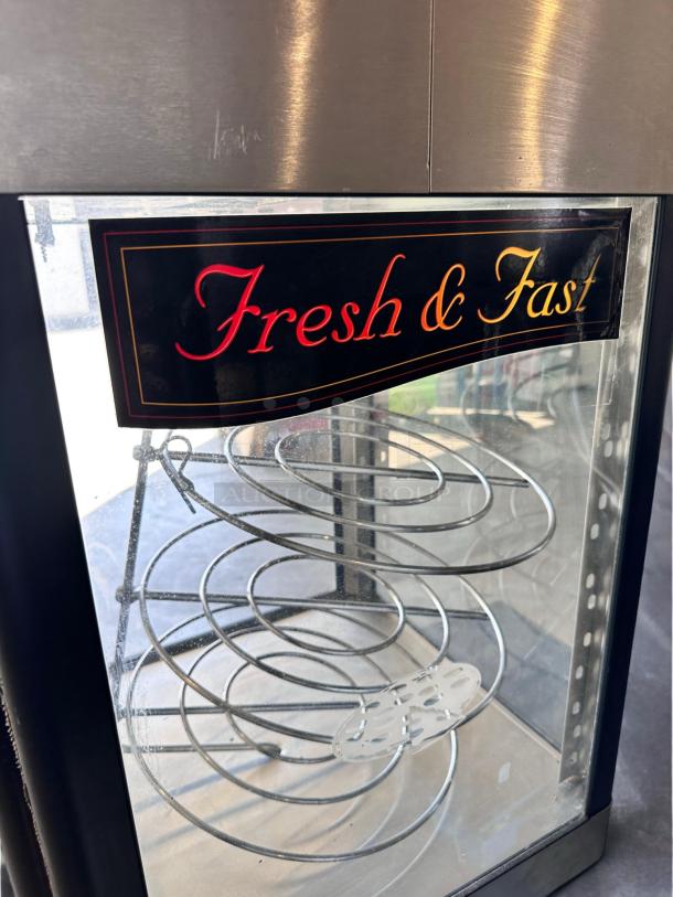 Star HFD-2A heated display cabinet with rotating racks, "Fresh & Fast" label, 120V, excellent condition, tested and working.