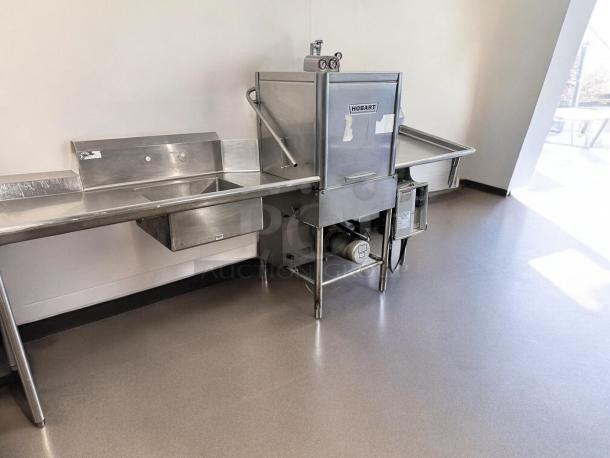 Hobart AM-12 high temp door-type dishwasher in excellent condition, fully tested, working, with 208-240V capacity.
