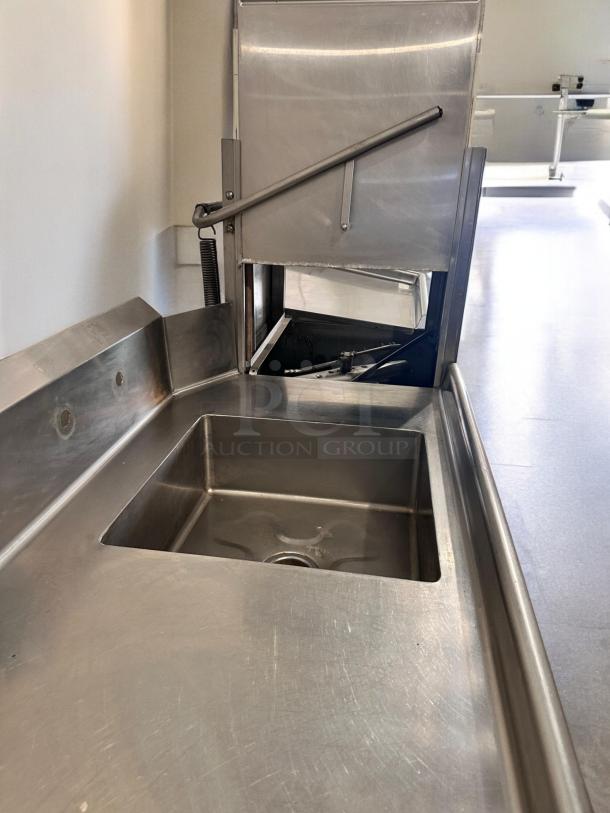 Hobart AM-12 high temp door-type dishwasher in excellent condition; stainless steel, 208–240V, fully tested.