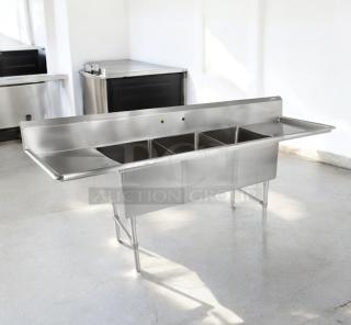 Stainless steel 3-compartment sink with dual drainboards, 132"L x 31"W x 42"H, excellent condition, fully tested.