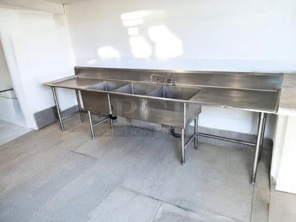 Stainless steel 3-compartment sink with dual drainboards, 132"x31"x42", excellent condition, fully tested and working.