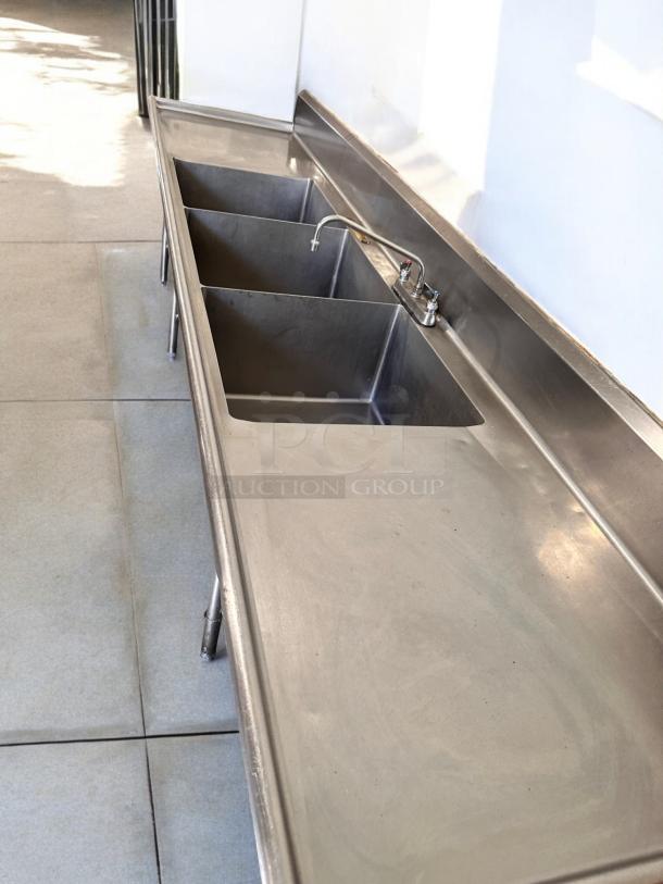 Stainless steel 3-compartment sink, dual drainboards, 132"x31"x42", excellent condition, fully tested, working.