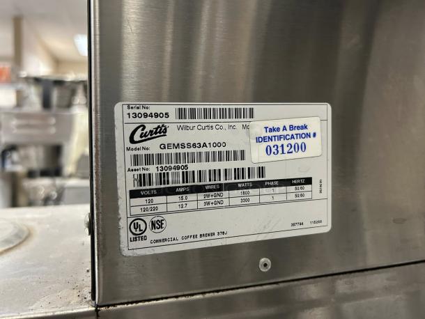 Curtis GEMSS63A1000 G3 Gemini 1.5 Gallon Coffee Brewer; label shows model, serial number 13094905, and voltage details.