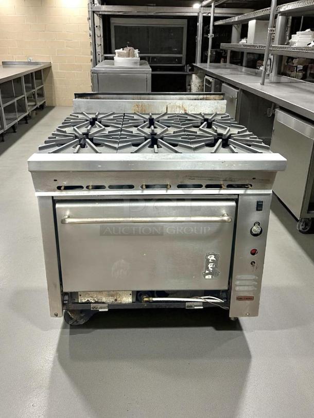 Montague 136-5 Legend gas range, six burners, 36", heavy-duty, excellent condition, fully tested, visible manufacturer label.