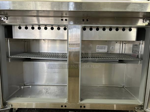 Continental Refrigerator SW48-N-18M 48" 2-Door sandwich prep table, stainless steel, fully tested, interior view.
