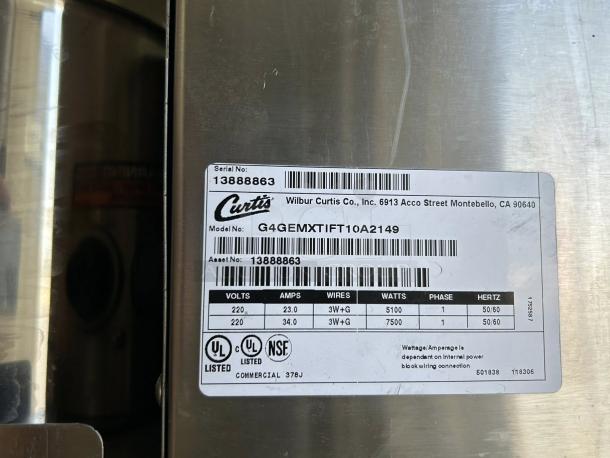 Curtis G4GEMXTIFT10A label on stainless steel surface, showing specs: asset no. 13888863, 220V, 5100W/7500W, UL/NSF listed.