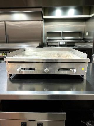 Stratus SMG-36 flat top griddle, natural gas, fully tested, excellent condition, stainless steel, three control knobs.
