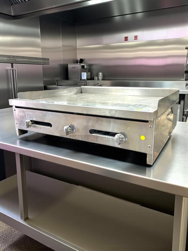 Stratus SMG-36 flat top griddle in excellent condition on stainless steel surface, natural gas, fully tested, working.