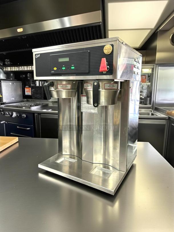 Curtis D1000GT12A000 Twin Airpot Coffee Brewer in great condition, 14.75", 220V, stainless steel, fully tested.