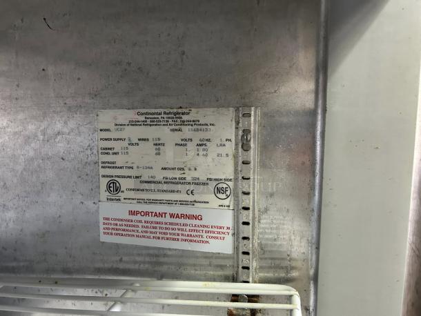 Continental UC27 undercounter refrigerator, 7.4 cu ft, front breathing, fully tested and working, visible model label.