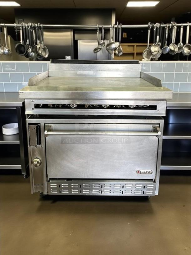 Jade JTRH-36G-36 gas range with 36" full griddle, manual controls, standard oven, 140,000 BTU, excellent condition.