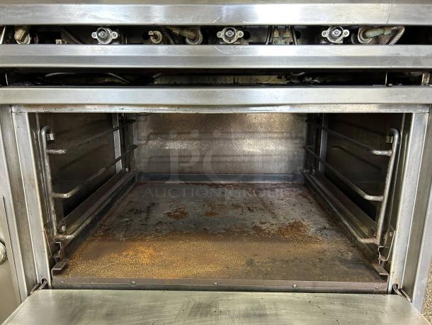 Jade JTRH-36G-36 gas range oven interior, showing metal racks and signs of use; fully tested and working condition.