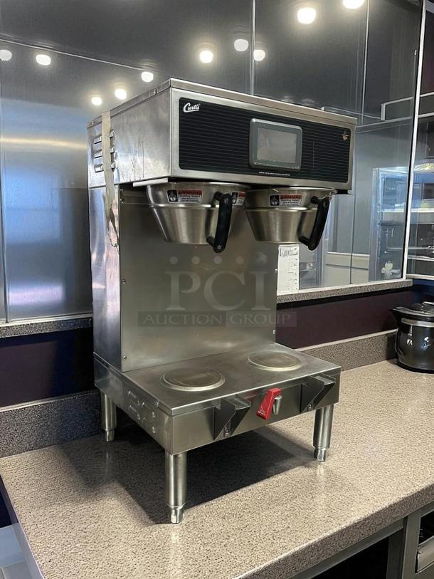 Curtis G4GEMT10A1000 twin satellite coffee brewer, 1 1/2 gal capacity, stainless steel, 220v, excellent condition.
