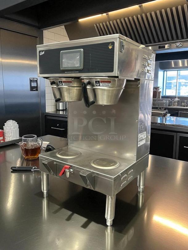 Curtis G4GEMT10A1000 Automatic Twin Satellite Coffee Brewer in great condition, 1.5 gal capacity, 220v/1ph, fully tested.