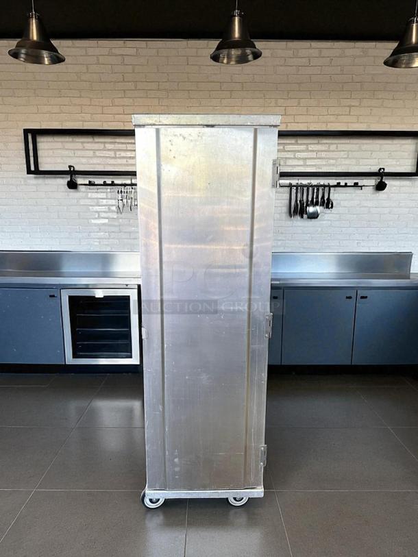 New Age 1290 Mobile Enclosed Pan Rack, excellent condition, holds 40 pans, HD base, fully tested, silver finish.