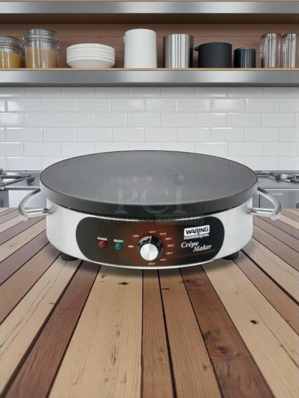 Waring WSC160 16" electric crepe maker in great condition, 120V. Features control panel with power, ready indicators.