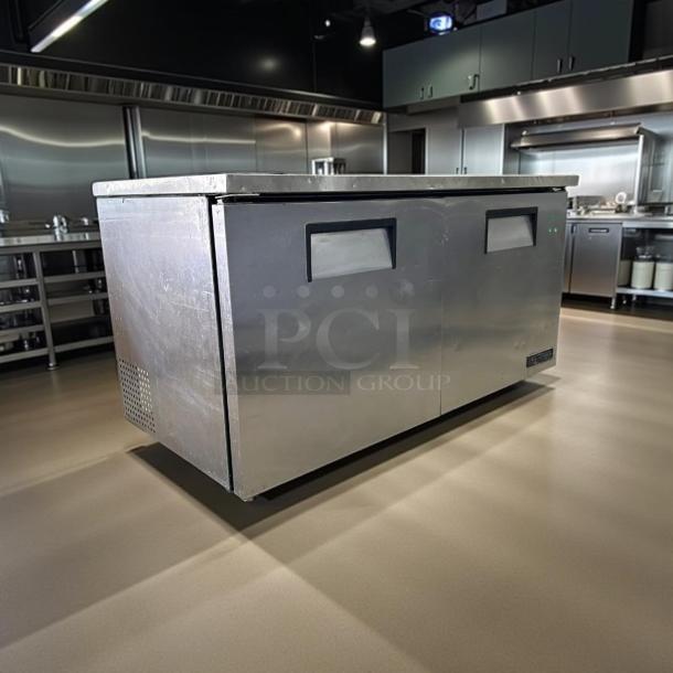True TUC-60F 60" stainless steel undercounter freezer in wonderful condition. Solid doors; fully tested and working.