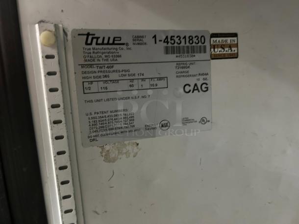 "True TUC-60F-HC stainless steel undercounter freezer label; model details, Made in USA, NSF certified, in excellent condition."