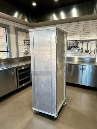 New Age 1290 mobile enclosed pan rack, excellent condition, holds (40) 18"x26" pans, HD base, fully tested and working.