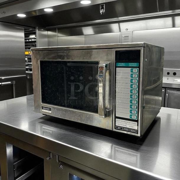 Sharp R23GTF stainless steel commercial microwave, 1600 watts, fully tested, working, keypad controls, excellent condition.