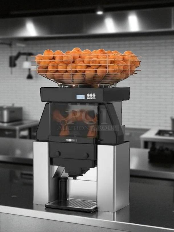 Zummo Z40-N commercial juicer, fully tested, excellent condition. Holds fresh oranges, stainless steel, electronic controls.