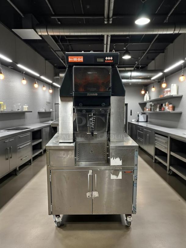 Zummo Z40-N Nature Commercial Juicer, stainless steel, fully tested, shows light wear, ideal for high-volume juice production.