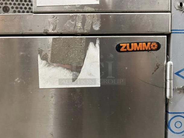 Zummo Z40-N Nature Automatic Juicer, stainless steel surface with visible wear, Zummo logo, fully tested and working.