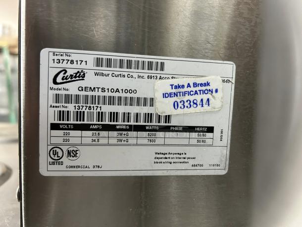 Curtis GEMTS10A1000 coffee brewer label, serial 13778171, 220v, UL and NSF listed, with identification sticker.