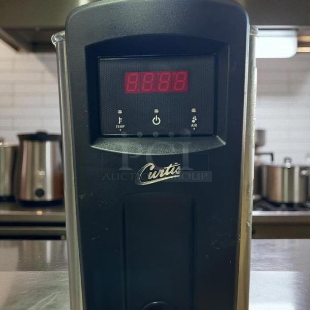 Curtis WB5NL hot water dispenser, excellent condition, 5 gal., digital display, 120-220v/1ph, fully tested and working.