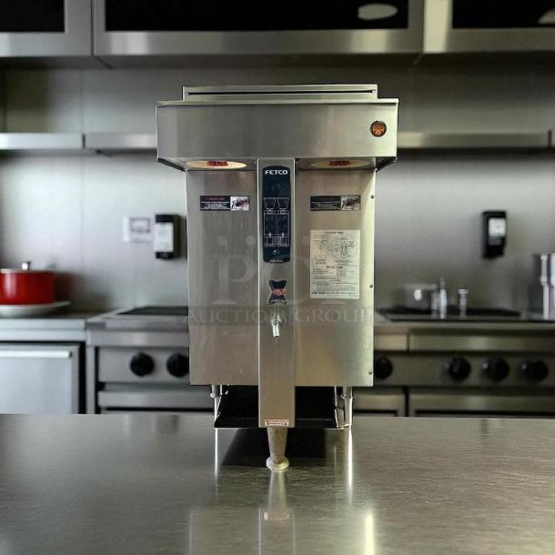 Fetco Extractor CBS-2042e coffee brewer in excellent condition. Stainless steel finish, tested working, twin 1-gallon capacity.