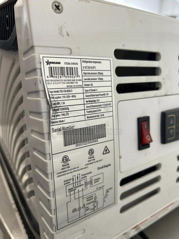 OMCAN 39553 46-in. sushi showcase, model RS-CN-0042-S, 42L capacity, fully tested, visible label details temperature and pressures.
