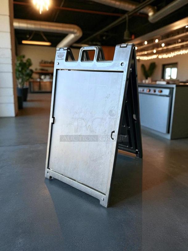 Signicade Plastic A-Frame Sign, Deluxe, 24x36", Black. Excellent condition, durable construction, visible handle for portability.