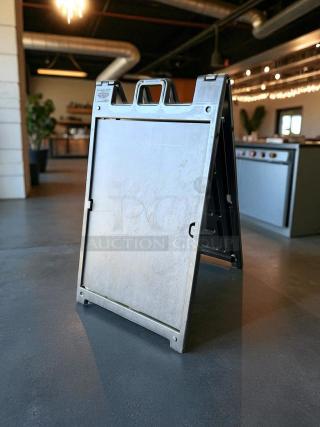 Signicade Plastic A-Frame Sign, Deluxe, 24x36", Black. Excellent condition, durable construction, visible handle for portability.
