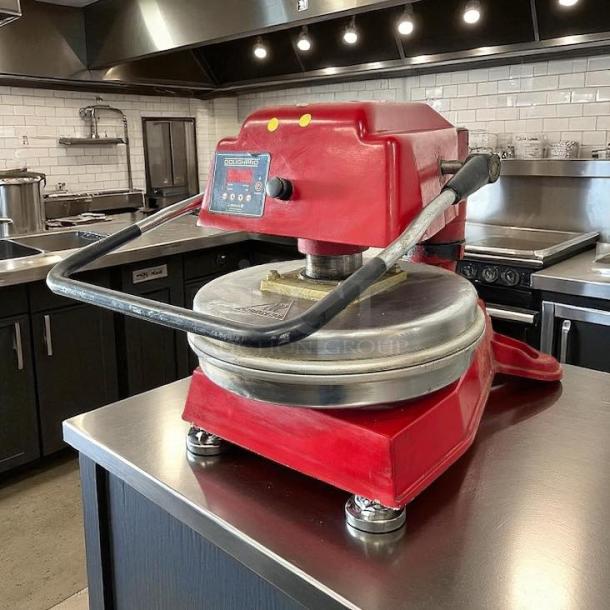 Proluxe DP1100 18” dough press in excellent condition on stainless steel counter, fully tested, red body, 115v.