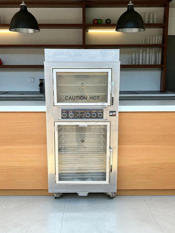 NuVU Model SUB-123P double deck electric oven proofer combo in perfect condition, features "Caution Hot" label.