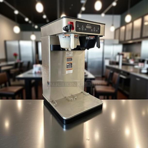 Bunn ITCB Twin HV tea/coffee brewer in great condition; tested and working. Stainless steel with control panel and dual dispensers.