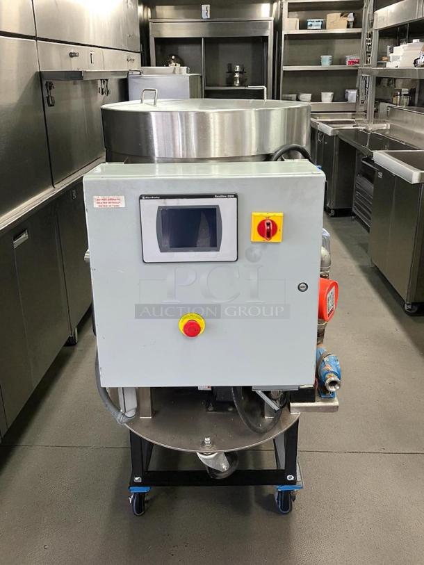 Savage Bros. Model #125 chocolate melter and conditioner, 300 lb capacity, fully tested, excellent condition, control panel visible.