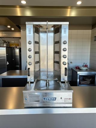 Attias GRY-8 electric gyro machine, 8 burners, stainless steel, tested and working, model label visible, excellent condition.