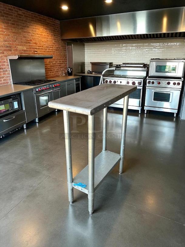 Stainless steel worktop table, great condition, sturdy, rectangular with undershelf, ideal for kitchen or workshop use.