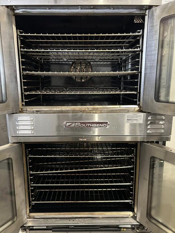 Southbend KLGS/27SC double convection oven, 53,000 BTU, excellent condition, open doors, interior racks visible, model label shown.