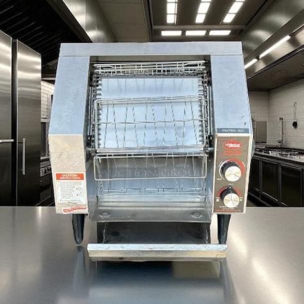 Hatco TRH-60 conveyor toaster, excellent condition, 300 slices/hour, 208V, stainless steel, fully tested, operational controls visible.