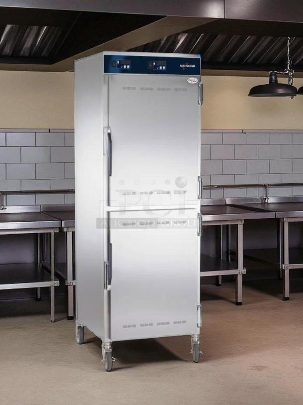 Alto-Shaam 1200-UP heated cabinet, excellent condition, 16-pan capacity, insulated, mobile, 120v, fully tested, in a commercial kitchen.